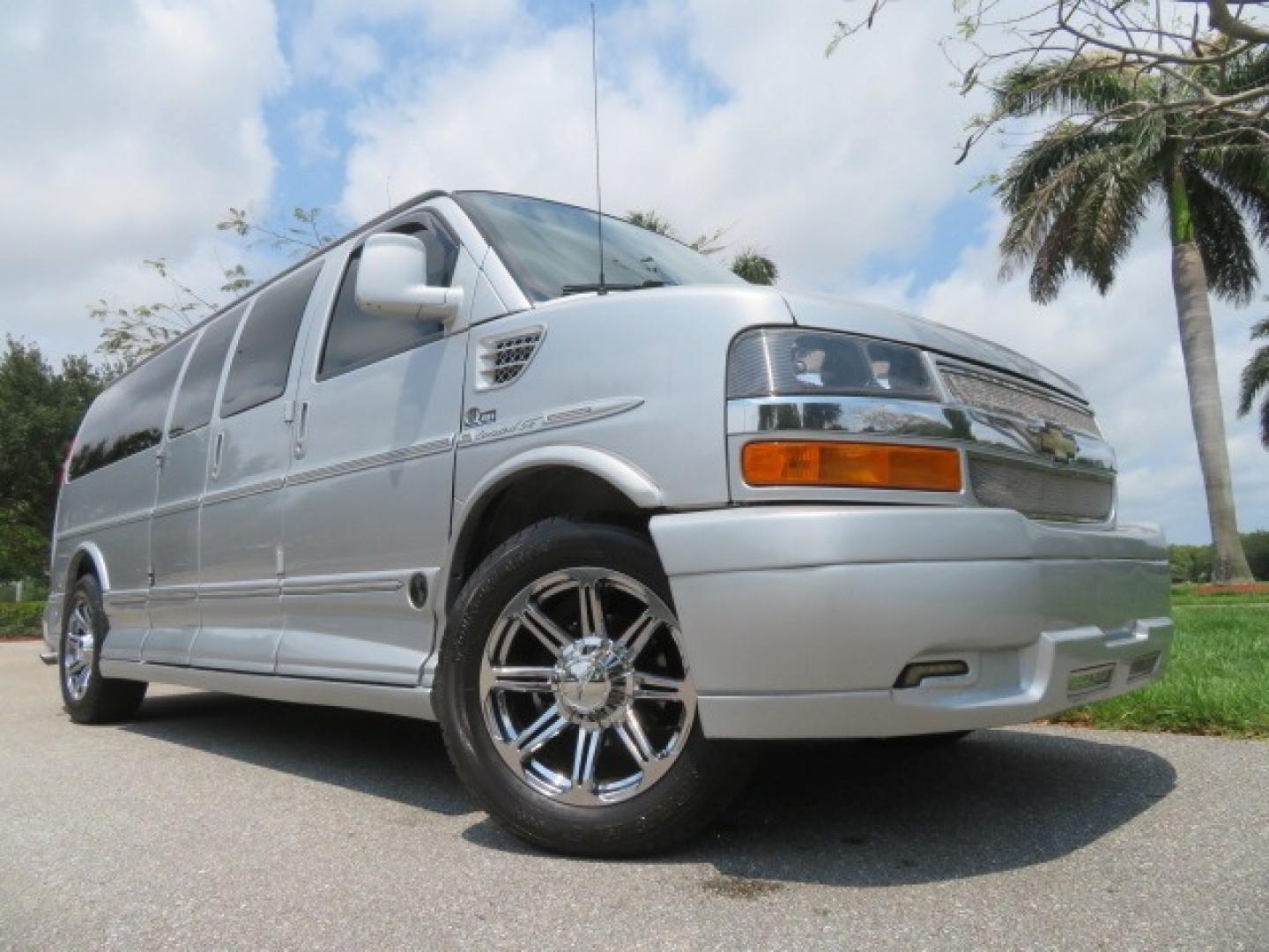 2014 Chevrolet Express (1GBWGLCG3E1) , located at 4301 Oak Circle #19, Boca Raton, FL, 33431, (954) 561-2499, 26.388861, -80.084038 - You are looking at a Rare 2014 Chevy Express 2500 Quigley 4x4 Four Wheel Drive Explorer Limited SE 9 Passenger Conversion Van with: 107K Original Miles, 6 Captain Chairs, Rear Power Folding Bench Seat Bed, Center Consoler Cooler, Front PPF (Paint Protection Film) Explorer Limited Conversion Througho - Photo#2